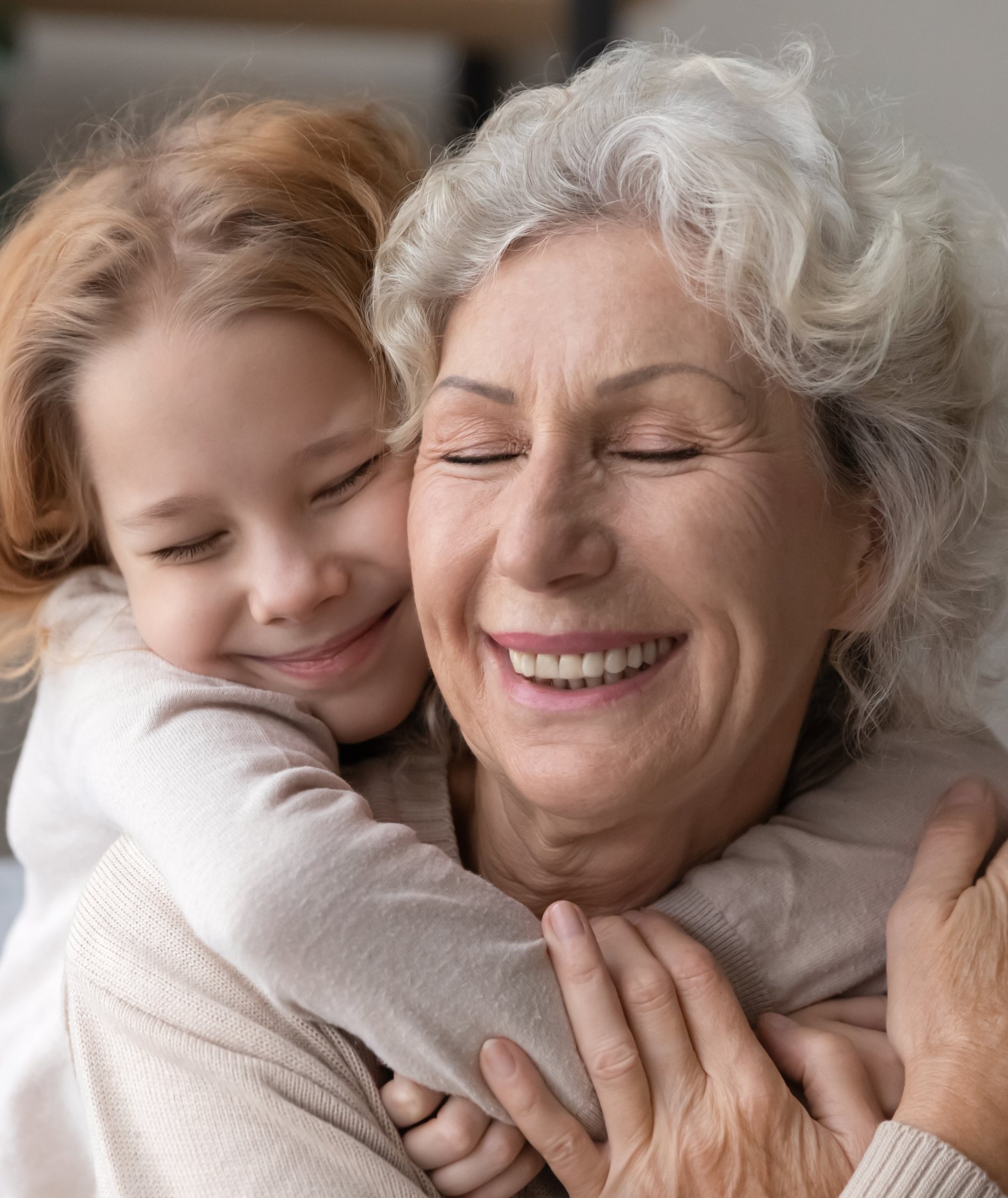 Grandmother smiling with a child